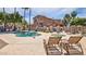Community pool, with chairs, a hot tub, and well-maintained amenities at 5415 E Mckellips Rd # 24, Mesa, AZ 85215