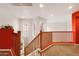 Open staircase with wood railing and natural light at 5415 E Mckellips Rd # 24, Mesa, AZ 85215