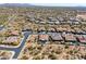 Aerial view of desert neighborhood featuring tile roof homes and desert landscaping at 5810 E Calle Marita E --, Cave Creek, AZ 85331