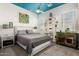 Comfortable bedroom featuring a soft gray bed, stylish nightstands, and ample natural light at 5810 E Calle Marita E --, Cave Creek, AZ 85331