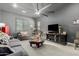 Comfortable living room with gray walls, plush seating, and a large fan, offering a relaxing atmosphere at 5810 E Calle Marita E --, Cave Creek, AZ 85331