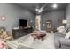 Cozy living room featuring a TV, comfortable seating, and stylish decor at 5810 E Calle Marita E --, Cave Creek, AZ 85331