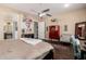 A spacious main bedroom featuring an ensuite bathroom, neutral walls, and plenty of natural light at 5810 E Calle Marita E --, Cave Creek, AZ 85331