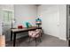 Home office with a desk, chair, artist's easel, and a closet with panel doors at 5810 E Calle Marita E --, Cave Creek, AZ 85331