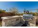 Well-equipped outdoor kitchen featuring a built-in grill and plenty of counter space at 5810 E Calle Marita E --, Cave Creek, AZ 85331