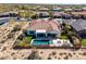 Aerial view of backyard featuring a pool, outdoor kitchen with bbq, fire pit, and lounge area at 5810 E Calle Marita E --, Cave Creek, AZ 85331