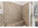 Tiled shower featuring a bench seat and neutral tones, offering a clean and modern design at 5810 E Calle Marita E --, Cave Creek, AZ 85331