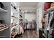 Spacious walk-in closet featuring built-in shelving and plenty of storage for clothes and accessories at 5810 E Calle Marita E --, Cave Creek, AZ 85331