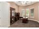 Comfortable home office with custom built-ins and large desk for remote working at 8260 N Buena Vista Dr, Casa Grande, AZ 85194