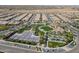 An aerial view showcasing community amenities, parks, and recreational areas within the neighborhood at 830 E Garden Basket Dr, Queen Creek, AZ 85140