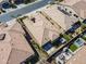 Aerial view of the home, showcasing the landscaped backyard and patio area at 830 E Garden Basket Dr, Queen Creek, AZ 85140