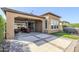 Beautiful backyard with a covered patio and plenty of hardscape for outdoor living and entertaining at 830 E Garden Basket Dr, Queen Creek, AZ 85140