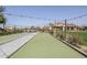 Scenic bocce ball court with string lights, perfect for community gatherings and outdoor recreation at 830 E Garden Basket Dr, Queen Creek, AZ 85140
