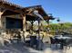 Outdoor seating area with comfortable seating and views of the grounds at 830 E Garden Basket Dr, Queen Creek, AZ 85140