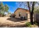 Large backyard featuring a mix of gravel and desert landscaping, offering a blank canvas for your outdoor dreams at 8520 E Laguna Azul Ave, Mesa, AZ 85209