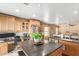 Well-lit kitchen features a large center island and lots of cabinets and counterspace at 8520 E Laguna Azul Ave, Mesa, AZ 85209