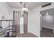 Bright dining area features wood-look floors and classic lighting fixture at 10859 W Coggins Dr, Sun City, AZ 85351