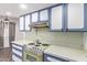 Cozy kitchen featuring vintage appliances and practical countertop space at 10859 W Coggins Dr, Sun City, AZ 85351