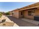 Private backyard featuring a covered patio and a tiled area at 10918 E Oro Ave, Mesa, AZ 85212
