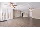 Spacious, open living room featuring hardwood floors and an open floor plan at 10918 E Oro Ave, Mesa, AZ 85212