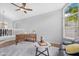 Bright living room with hardwood floors, high ceilings, white railing, and a comfortable seating area at 1225 E Sea Gull Dr, Gilbert, AZ 85234