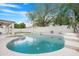 Inviting backyard features a sparkling swimming pool with a lounge area at 1225 E Sea Gull Dr, Gilbert, AZ 85234