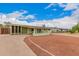 Attractive home with a long driveway and landscaped yard providing great curb appeal at 1238 E Barcelona Ave, Casa Grande, AZ 85122