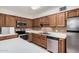 Well-equipped kitchen with modern appliances, sleek countertops and plenty of storage space at 1238 E Barcelona Ave, Casa Grande, AZ 85122