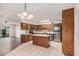 Spacious kitchen with stainless steel appliances and ample cabinet space, ideal for culinary enthusiasts at 1238 E Barcelona Ave, Casa Grande, AZ 85122