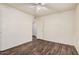 Main bedroom boasts hardwood floors, closet and bathroom access at 1238 E Barcelona Ave, Casa Grande, AZ 85122