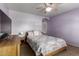 Calming bedroom with a tv and natural light at 13516 W Windsor Blvd, Litchfield Park, AZ 85340