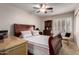 Bedroom featuring a ceiling fan and closet at 13516 W Windsor Blvd, Litchfield Park, AZ 85340