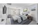 Serene bedroom with neutral colors, plush carpet, and plenty of natural light at 14636 W Sand Hills Rd, Surprise, AZ 85387
