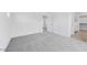 This spacious bedroom boasts soft carpet and offers entry into a full ensuite bathroom at 14636 W Sand Hills Rd, Surprise, AZ 85387