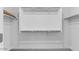 Bright, walk-in closet offers ample storage space at 14636 W Sand Hills Rd, Surprise, AZ 85387