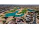 Community aerial shot of golf course, lakes, neighborhood, and real estate at 15900 W Autumn Cir, Surprise, AZ 85374