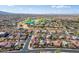 Aerial view of a home in a golf course community highlighting desert landscaping at 15900 W Autumn Cir, Surprise, AZ 85374