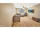 Comfortable bedroom setup with a large sectional sofa and neutral carpet at 18902 W Clinton St, Surprise, AZ 85388