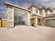 Spacious two-story home featuring a three-car garage and attractive stone accents at 18902 W Clinton St, Surprise, AZ 85388