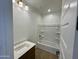 Full bathroom featuring a shower/tub combo, a single sink vanity and an exhaust fan at 1978 W Lariat Ln, Phoenix, AZ 85085