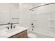 Well-lit bathroom featuring a modern vanity, toilet, and a shower-tub combination at 1978 W Lariat Ln, Phoenix, AZ 85085