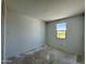 Bright bedroom featuring a window with natural light and neutral wall color at 1978 W Lariat Ln, Phoenix, AZ 85085
