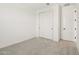 A bedroom featuring carpet and a closet provides a cozy, organized living space at 1978 W Lariat Ln, Phoenix, AZ 85085