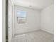 Cozy bedroom with soft carpet and a window letting in natural light at 1978 W Lariat Ln, Phoenix, AZ 85085