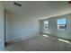 Spacious bedroom featuring two windows providing ample natural light and neighborhood views at 1978 W Lariat Ln, Phoenix, AZ 85085