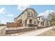 Charming two-story home featuring stone accents, neutral stucco, and a well-maintained landscaped yard at 1978 W Lariat Ln, Phoenix, AZ 85085