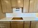 Kitchen featuring a white countertop and wood cabinetry, ready for personalized design at 1978 W Lariat Ln, Phoenix, AZ 85085