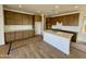Gourmet kitchen featuring white countertops, kitchen island and shaker cabinets at 1978 W Lariat Ln, Phoenix, AZ 85085