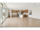 Spacious eat-in kitchen features a large island, wood flooring, modern appliances, and plenty of cabinets for storage at 1978 W Lariat Ln, Phoenix, AZ 85085