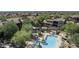 Elevated aerial view of resort-style pool and spa in residential community at 20750 N 87Th St # 2074, Scottsdale, AZ 85255